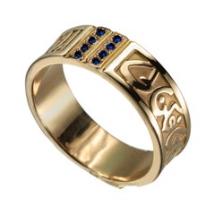 18 Karat Gold and 0.15 Carat Sapphire Circles of Eternity Band Ring