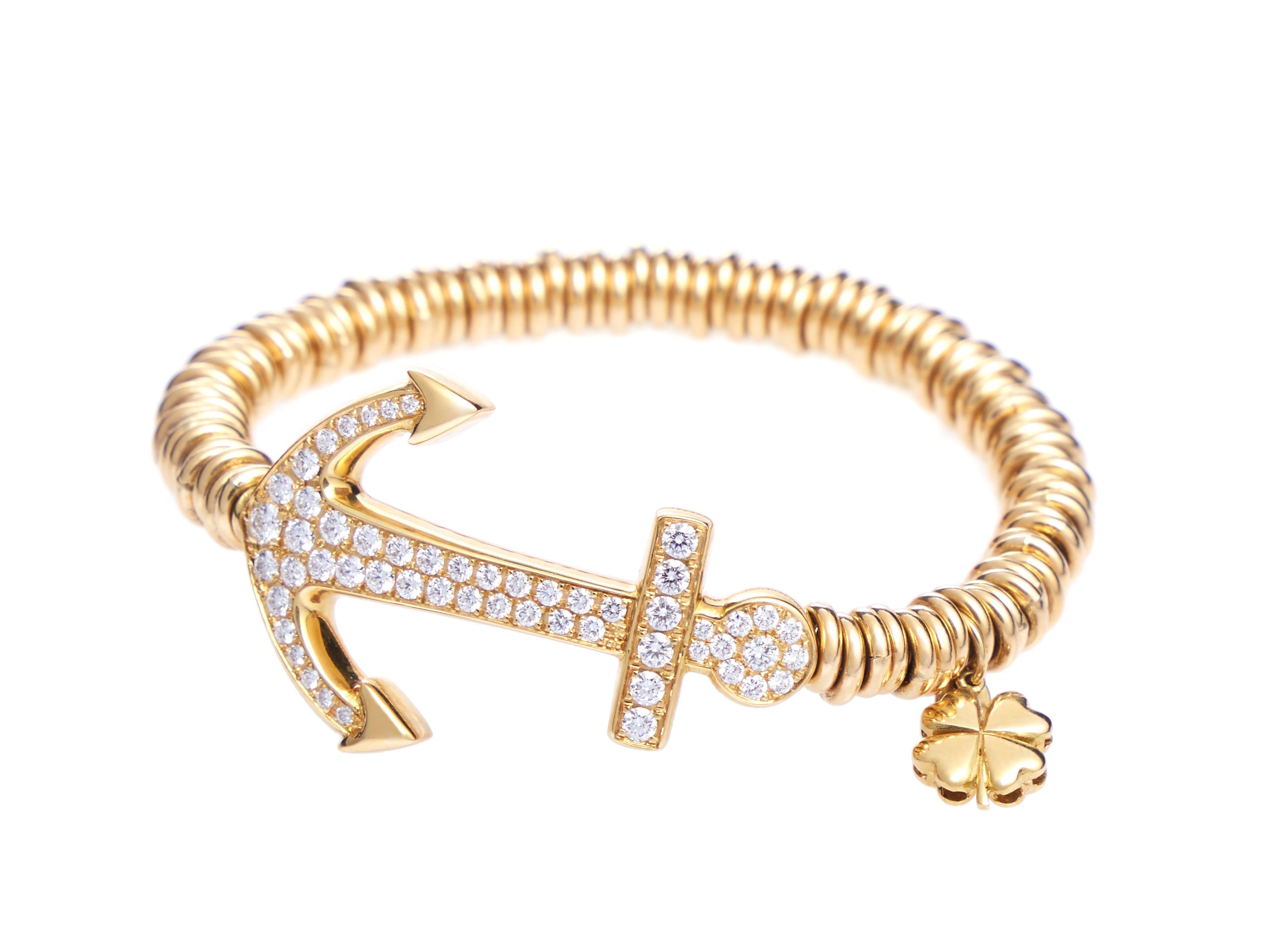This exquisite 18 karat yellow gold stretch bracelet showcases an anchor with 55 sparkling round diamonds, to create a tasteful and eye-catching look. The expanding stretching action makes this bracelet easy and comfortable to slip on and off, while