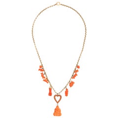 18 Karat Gold and Coral Buddha Charm Necklace