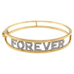18 Karat Gold and Diamond "Forever" Bangle