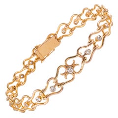 18 Karat Gold and Diamond French Victorian “Heart” Link Bracelet