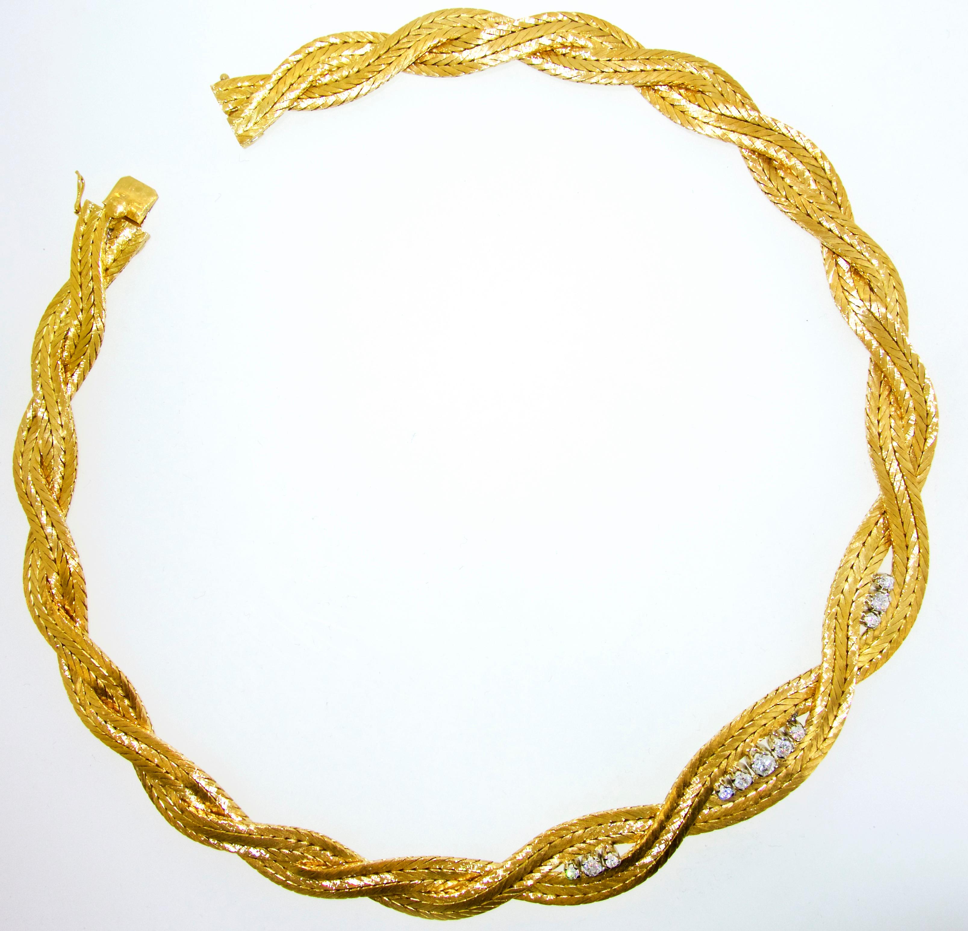 18K bright yellow gold set in the front with fine white diamonds (H,VS1).  The round brilliant cut diamonds are well set and matched and weigh approximately .75 cts.  This collar-necklace fits right right at the collar bone (note that our mannequin