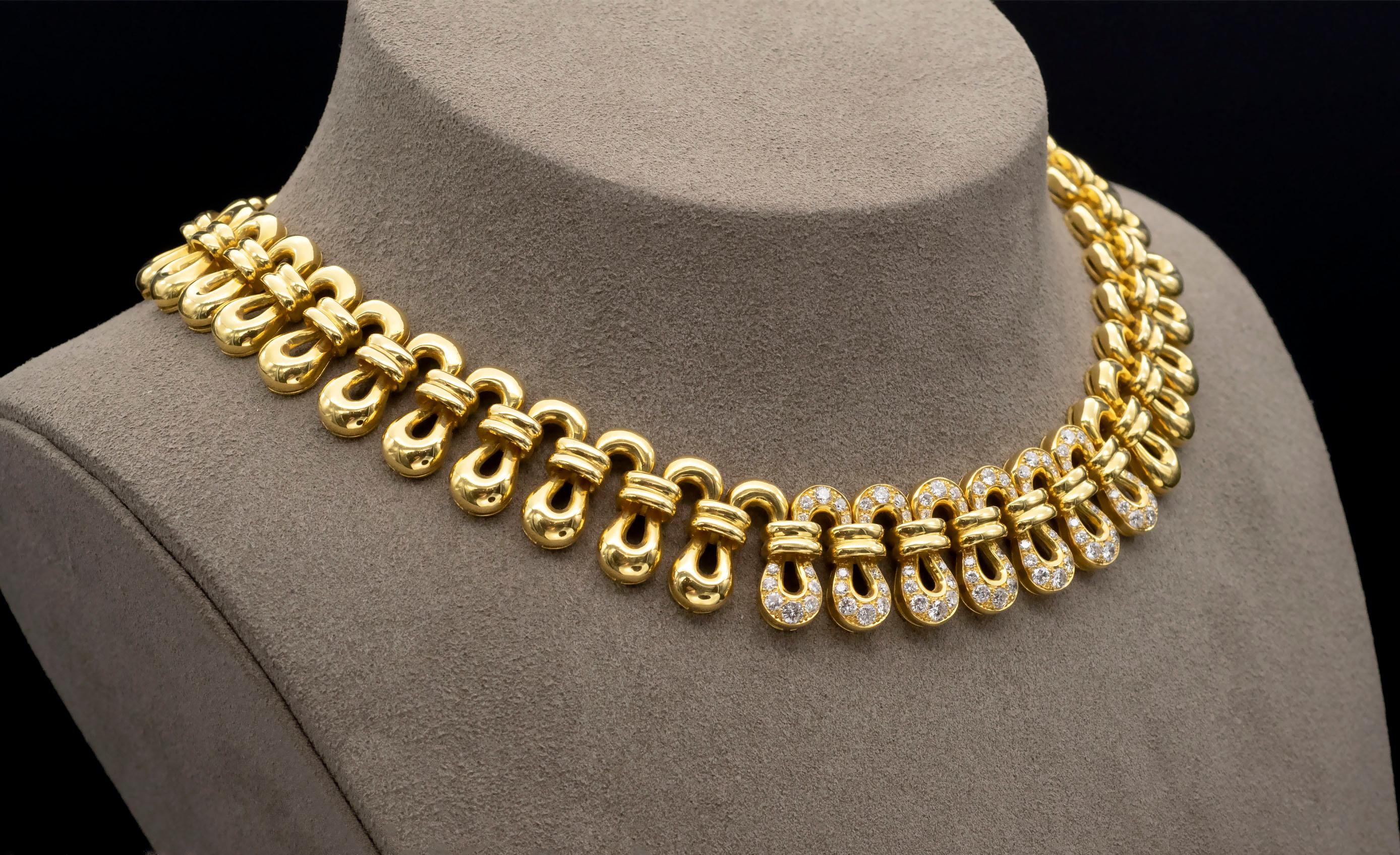 Stylish 18 karat Gold choker necklace set with 2.6 carats of high quality pave set round brilliant cut diamonds ( F-G color, VVS-VS clarity). It is fully articulated and sits perfectly on the neck, the make is excellent.
Length 38 cm
Weight 95.2