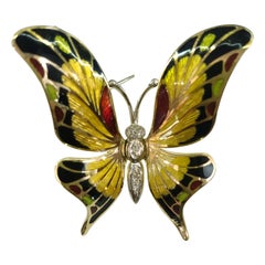Broche en or 18 carats et émail
