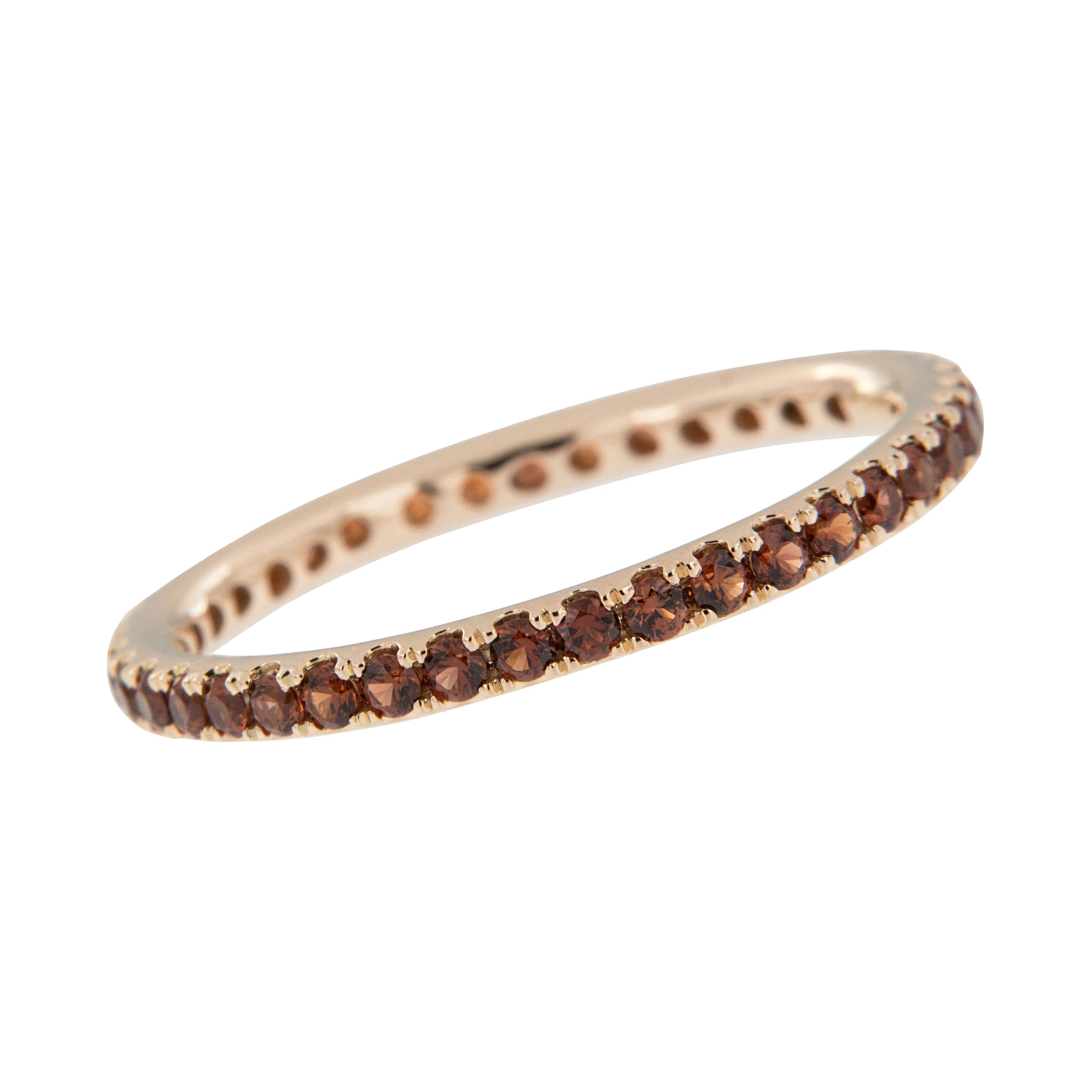 18 Karat Gold and Garnet Eternity Ring For Sale