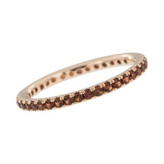 Anillo Eternidad Oro 18 Kilates y Granate