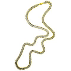 18 Karat Gold and Platinum Woven Long Chain, circa 1950
