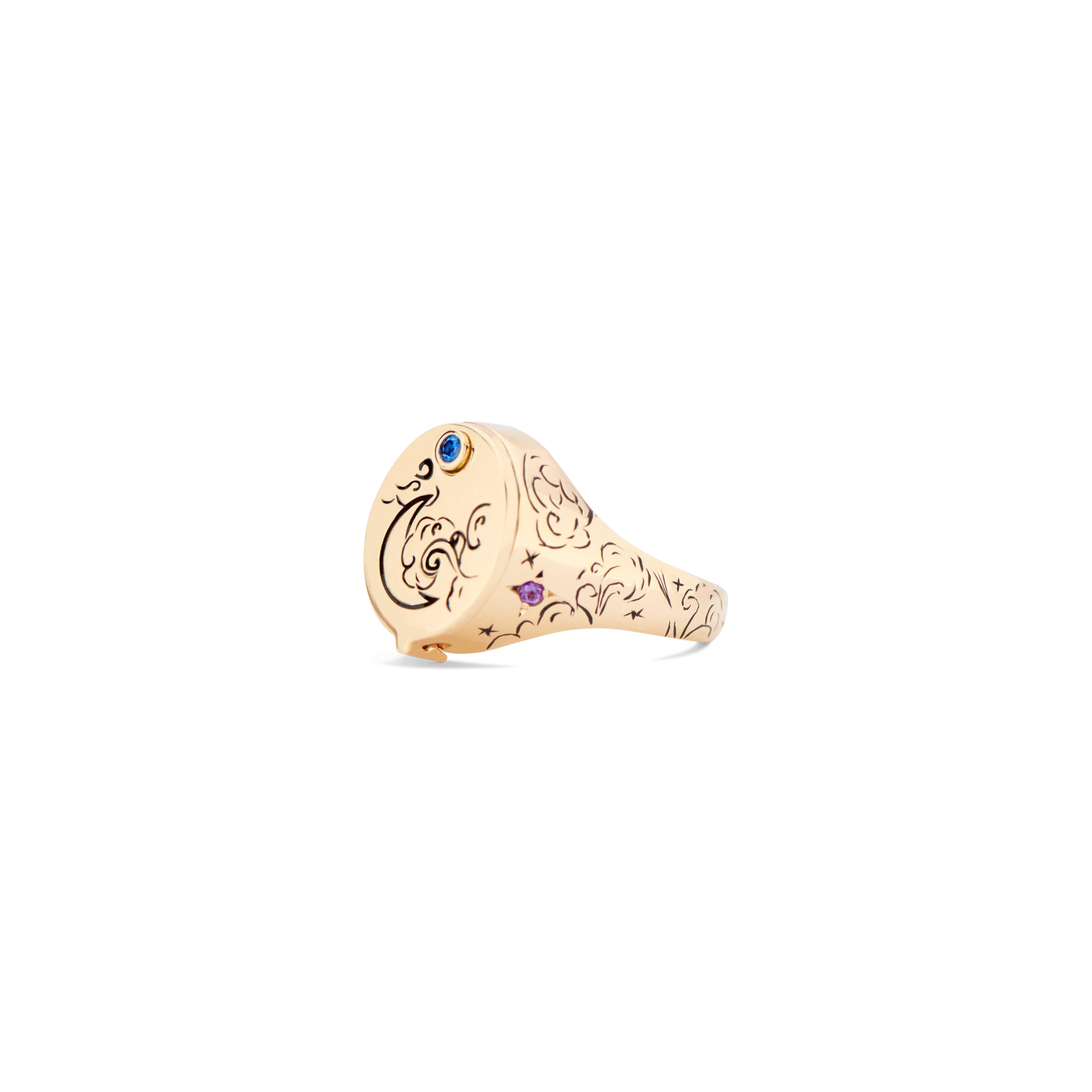 The uniquely sleek 18k yellow gold and rainbow sapphire Beacon Conservatory Signet features a 