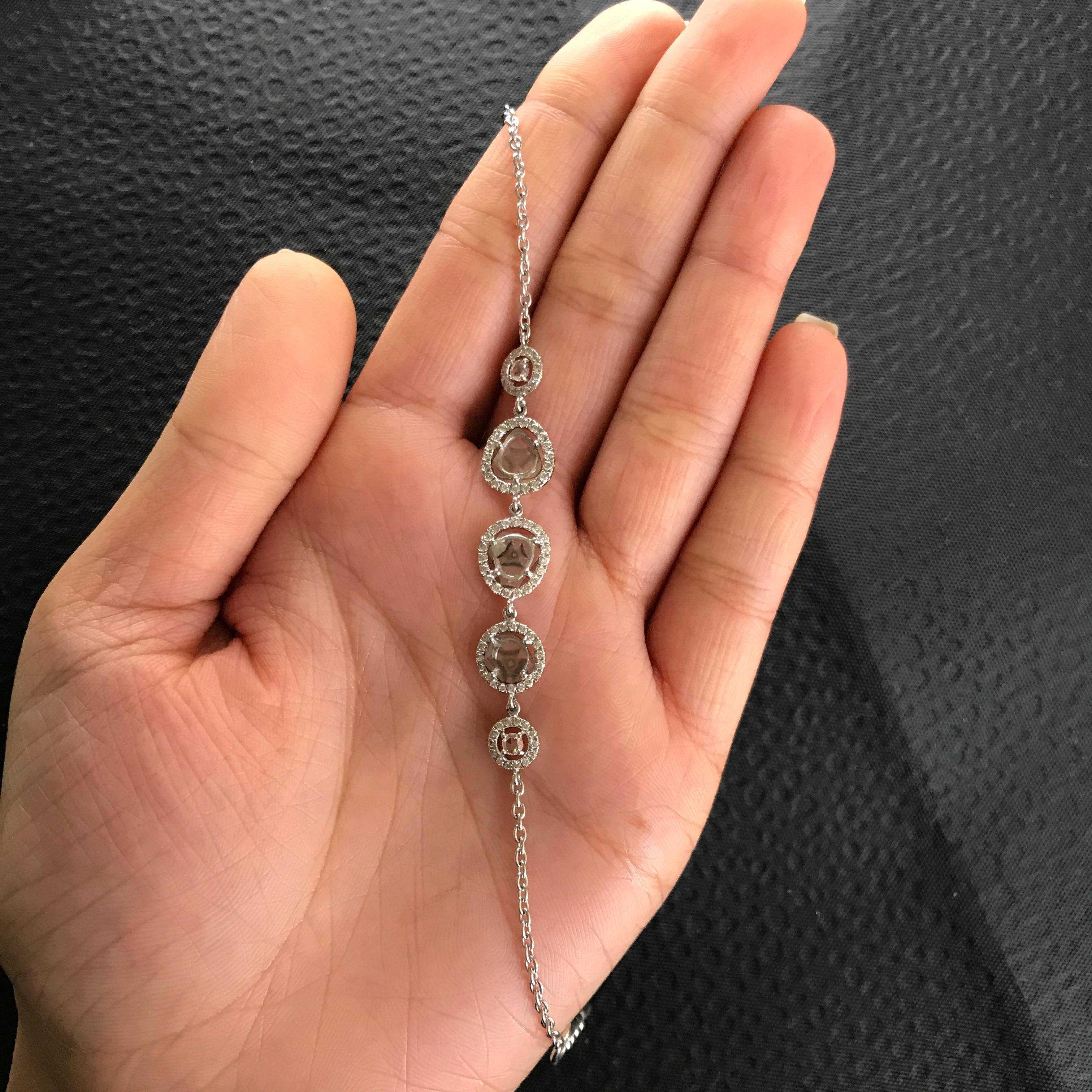 An effortless piece of accessory, where the length can be adjustable using the lobster clasp and chain. 

Diamond Details: 
Cut: Rose Cut (0.77 carats)
Cut: Round (0.6 carats)

18K Gold: 5.47 grams
