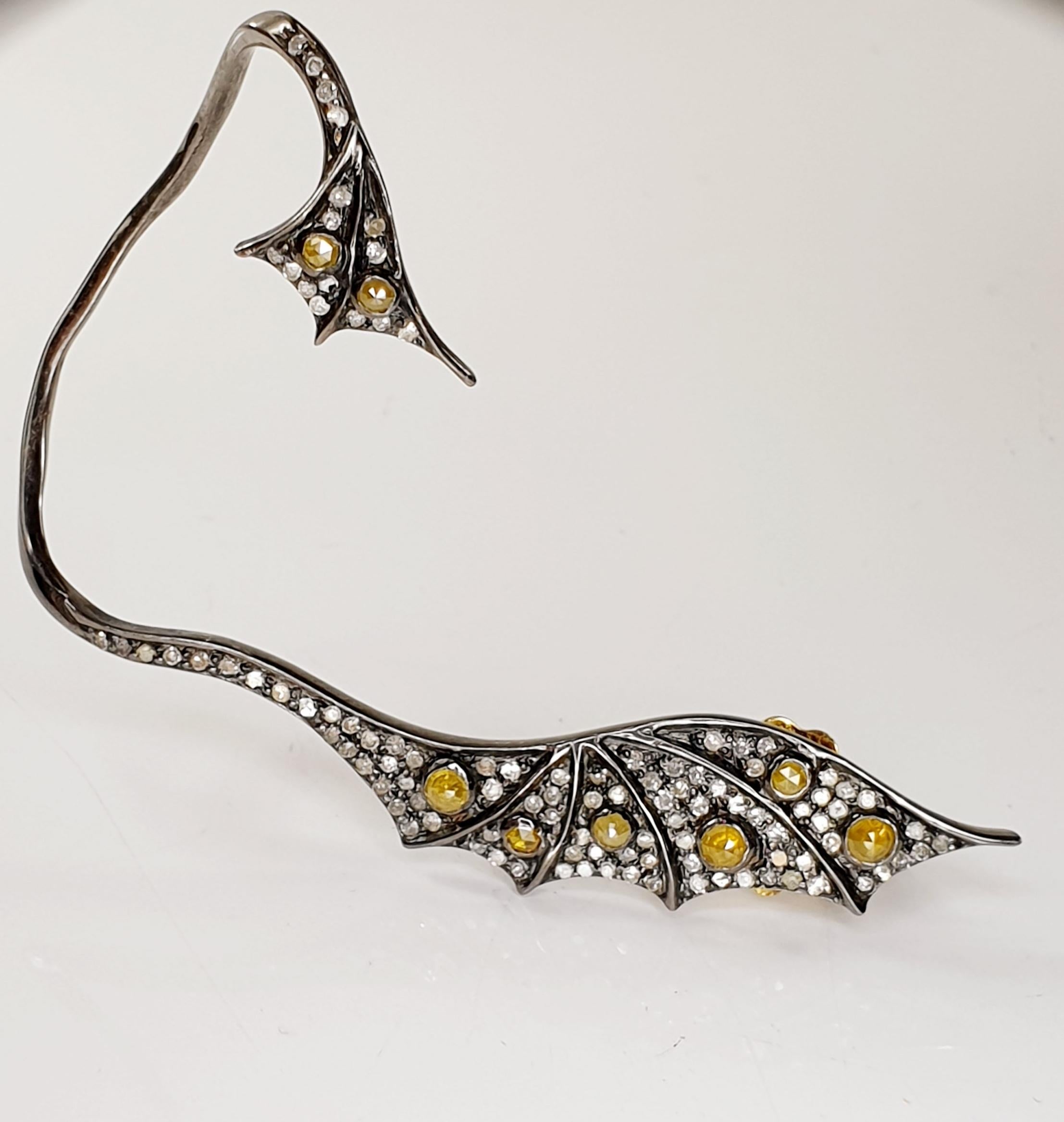 Contemporary 18 Karat Gold and Silver Dragon Cuff Earrings with Diamonds and Yellow Saphires For Sale