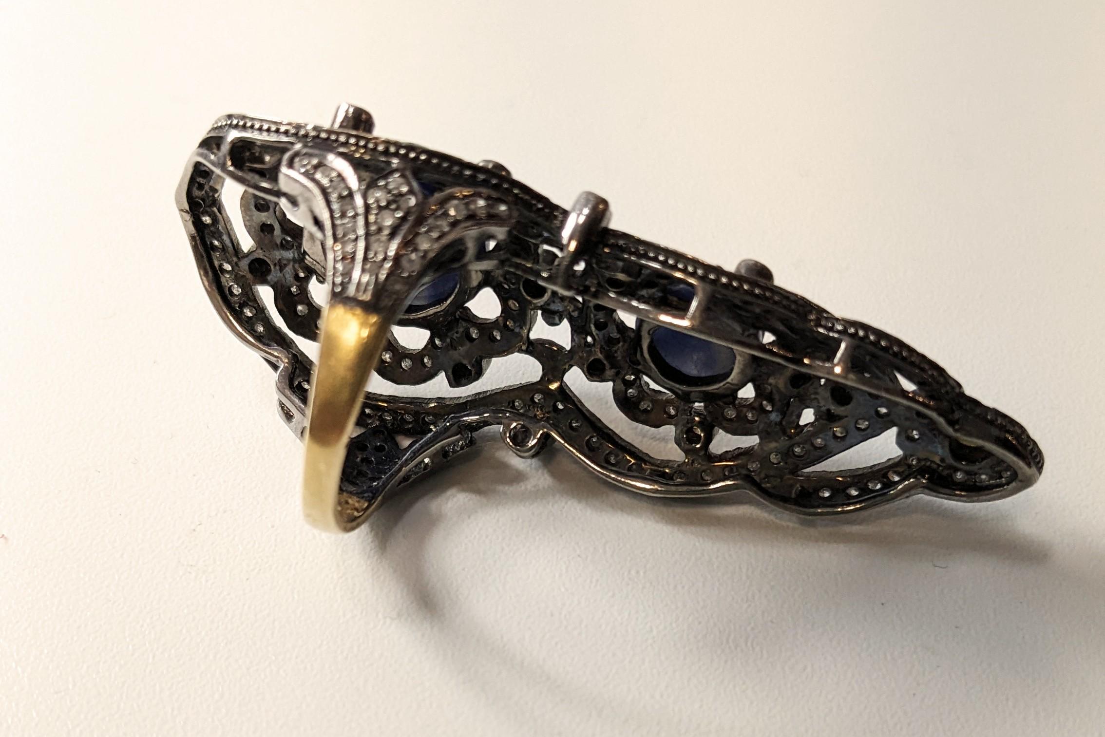 18 Karat Gold and Silver Ring with Diamonds and carved  Sapphires For Sale 1