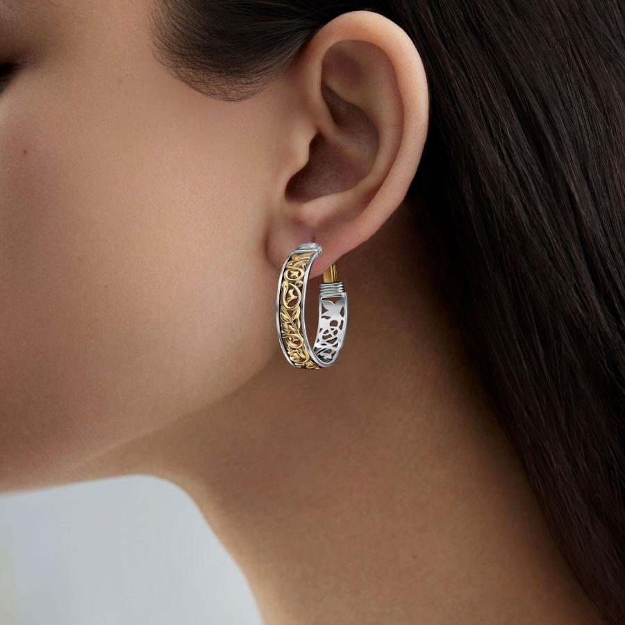 Sterling Silver and 18 Karat Gold Hoop Earrings featuring Azza Fahmy's signature hand-piercing technique. 

These 18 Karat Gold and Sterling Silver Blessings Hoop Earrings are adorned with floral motifs, and inscribed with ‘حب’ – ‘Love’, 'سلام' –