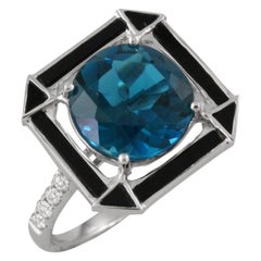 18 Karat Gold Cocktail Ring w/ London Blue Topaz, Black Onyx 
Diamonds