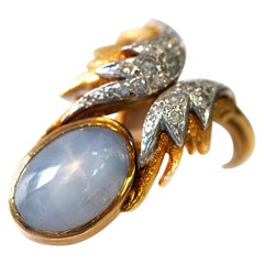 18 Karat Gold Art Deco Ladies Blue Star Sapphire and Diamond Cocktail Ring