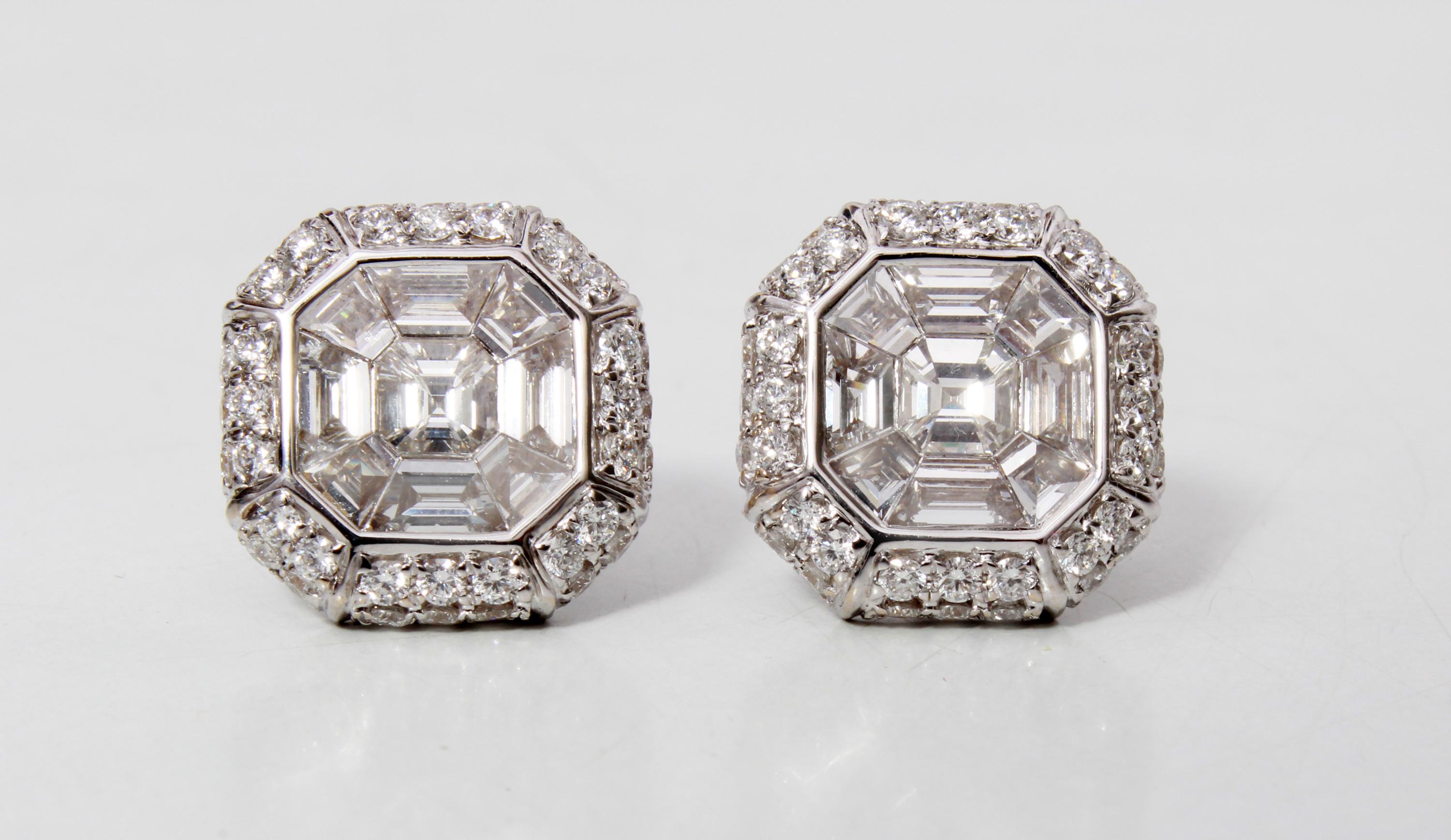 Great pair of matching diamond earrings. This pair of earrings has 18 pieces of Asscher cut diamonds which weigh 2.59 carats. With that it has 80 pieces of white round diamonds which weigh 1.36 carats. The earrings are made in 18K White Gold and