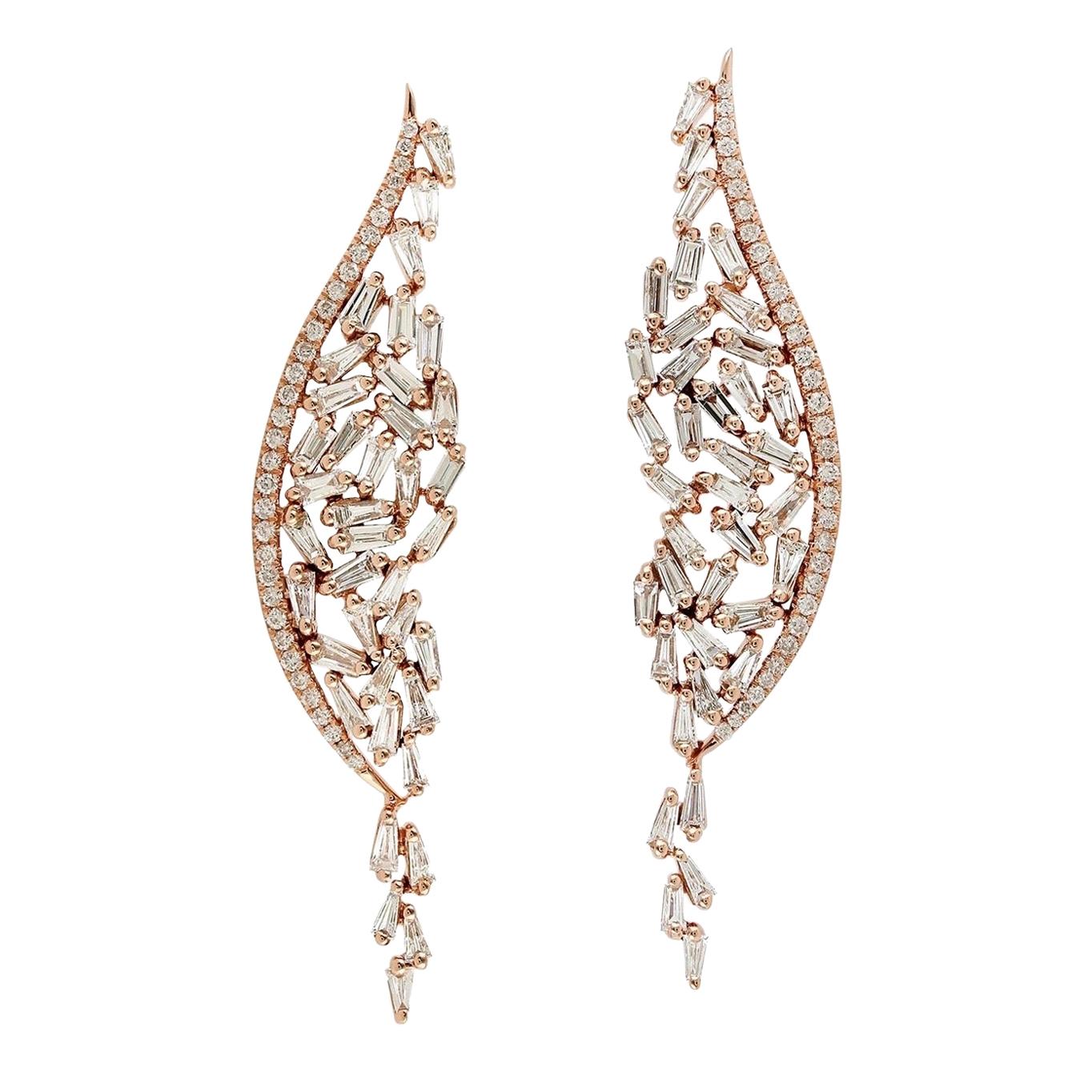 Boucles d'oreilles en or 18 carats avec diamants baguettes