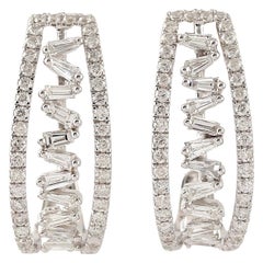 Boucles d'oreilles baguette en or 18 carats avec diamants