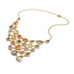 18 Karat Gold Bib Necklace with over 40 Carat of Blue and Multicolored Sapphires