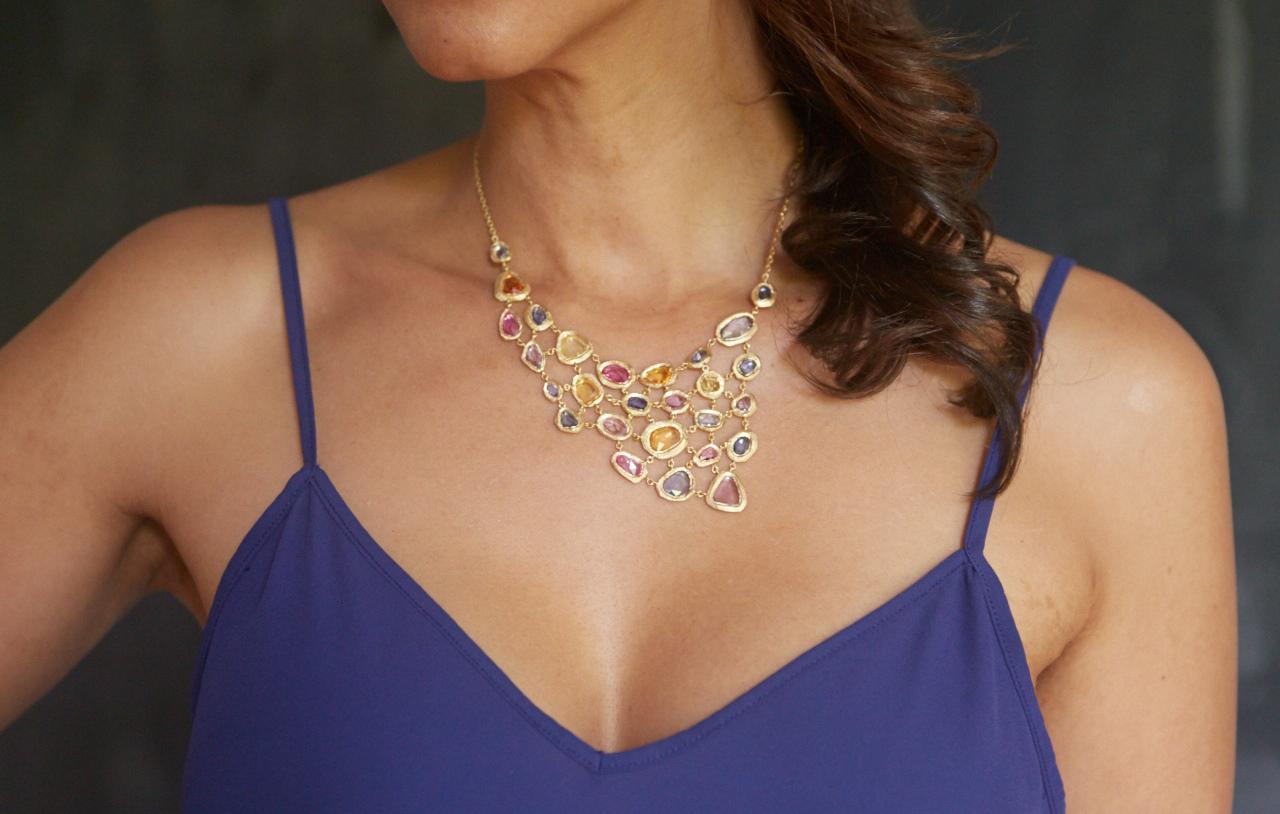 Artisan 18 Karat Gold Bib Necklace with over 40 Carat of Blue and Multicolored Sapphires For Sale