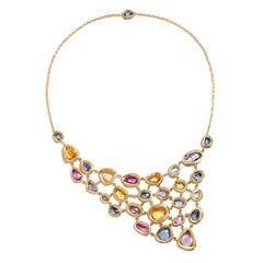 18 Karat Gold Bib Necklace with over 40 Carat of Blue and Multicolored Sapphires