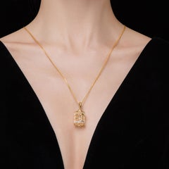 Pendentif en forme de cage d'oiseau en or 18 carats et diamants avec collier