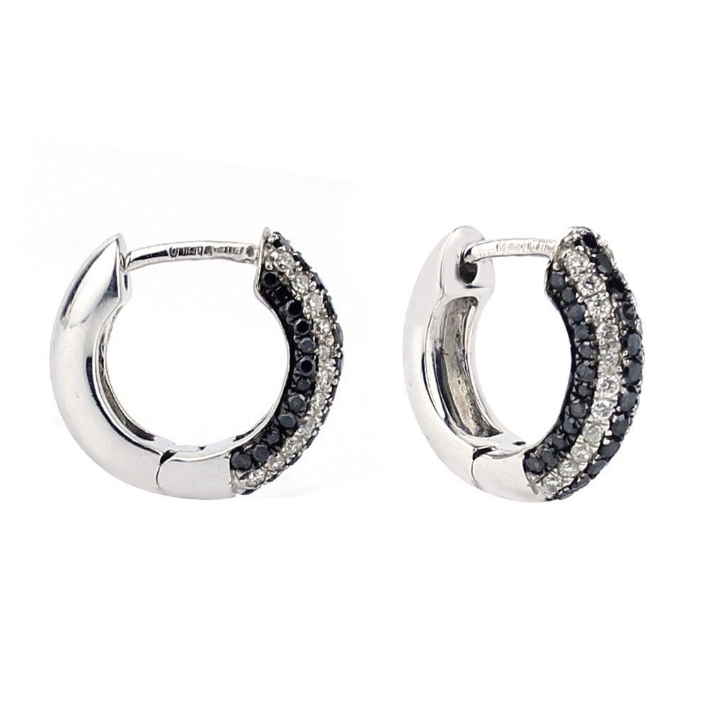 Cast from 18-karat gold, these beautiful huggie hoop earrings are set with .45 carats of sparkling black and white diamonds. 

FOLLOW MEGHNA JEWELS storefront to view the latest collection & exclusive pieces. Meghna Jewels is proudly rated as a Top