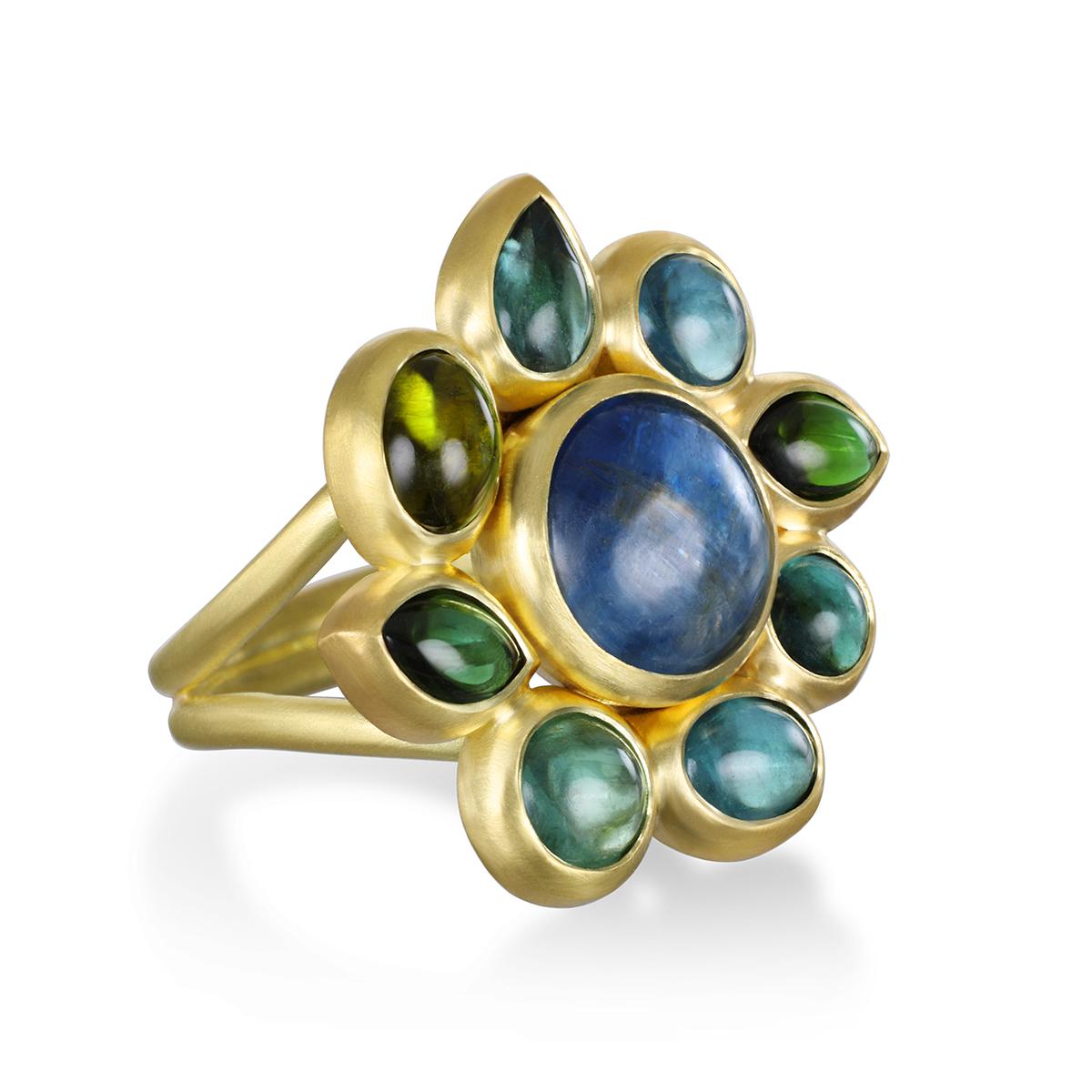 Unique, one of a kind and handcrafted - Faye Kim's 18 Karat Gold Blue-Green Tourmaline Daisy Ring, with its bezel settings and matte finish, blends the beauty of spectacular gemstones and nature into a singular masterpiece. Large center blue