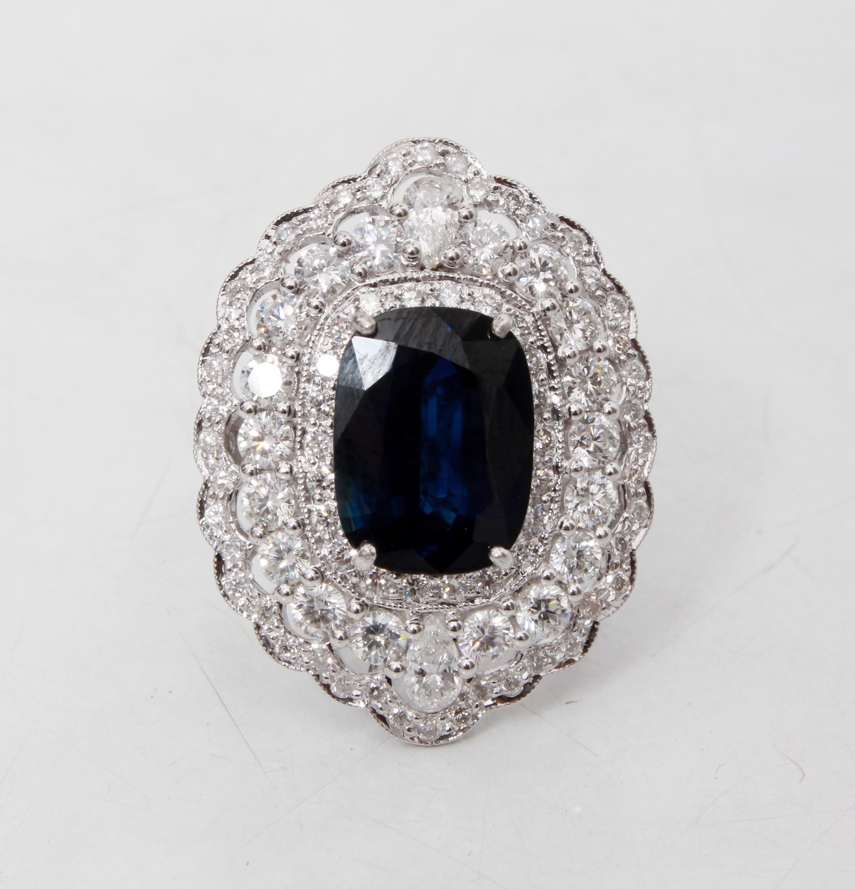Modern 18 Karat Gold Blue Sapphire and Diamond Ring For Sale