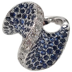 Bague en or 18 carats avec saphir bleu et diamant