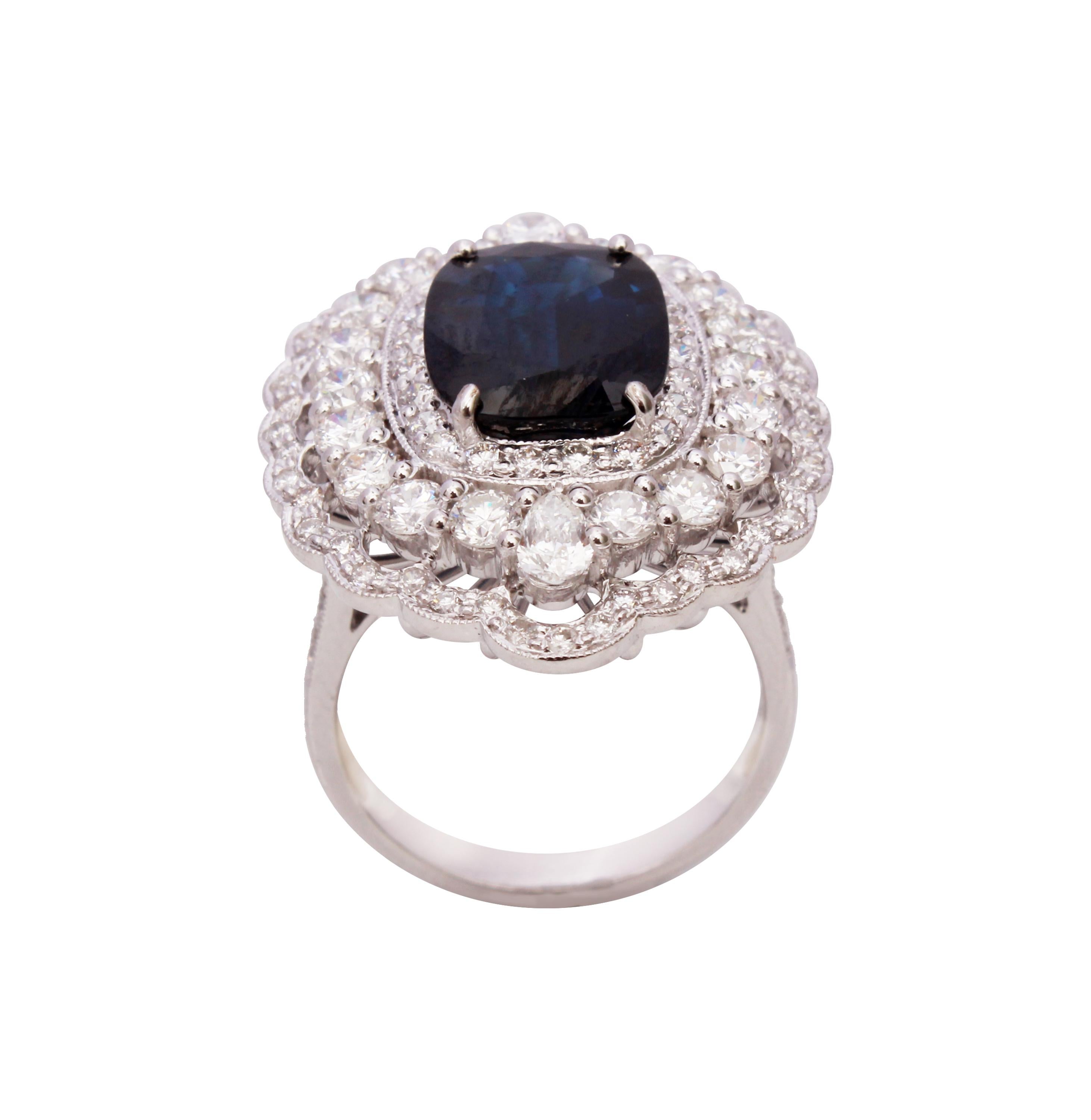 18 Karat Gold Blue Sapphire and Diamond Ring For Sale