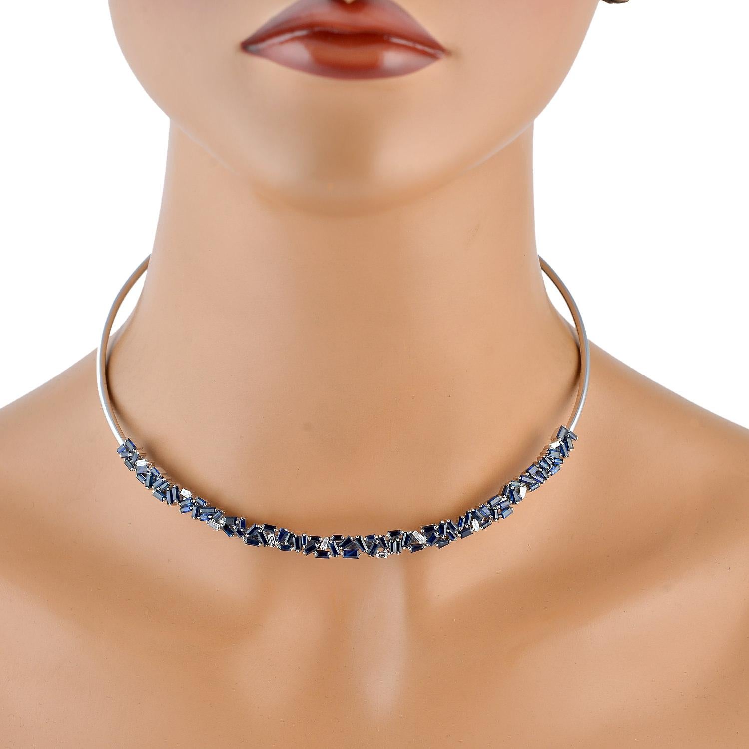 Cast in 18 karat gold, this stunning choker necklace is hand set in 9.02 carats baguette cut sapphire and .55 carats diamonds. 

FOLLOW  MEGHNA JEWELS storefront to view the latest collection & exclusive pieces.  Meghna Jewels is proudly rated as a