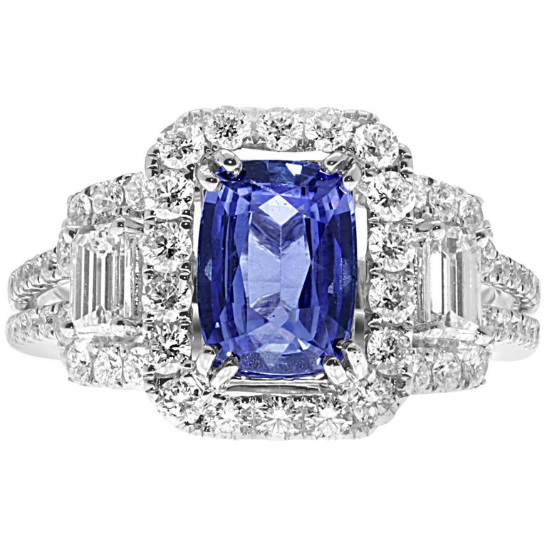 18 Karat Gold Blue Sapphire Ring Set with Brilliant and Baguettes Cut ...