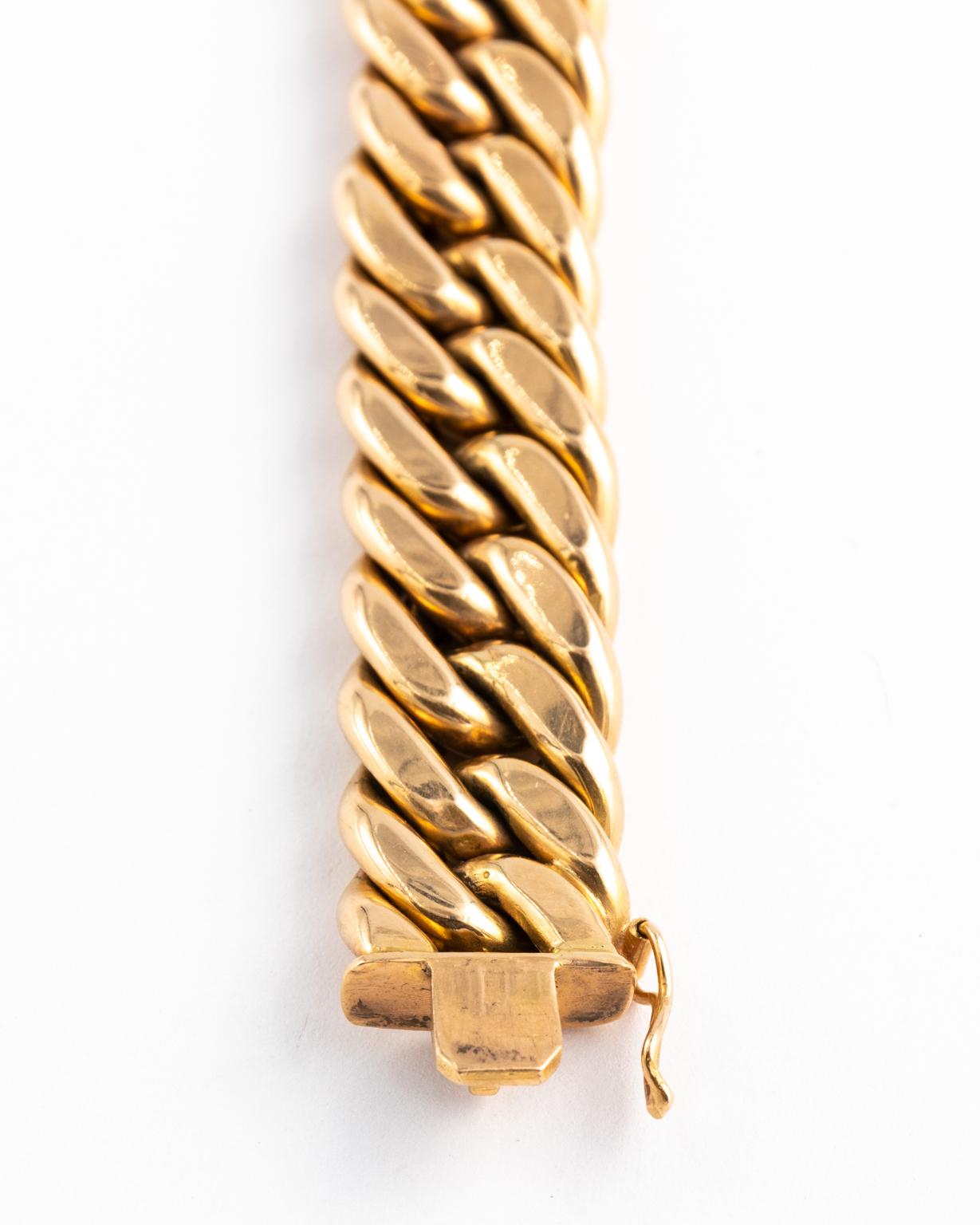 Circa mid 20th century vintage curb link 18 karat gold bracelet, marked 