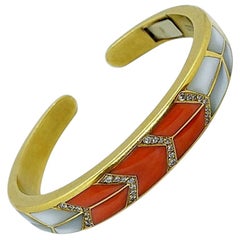 18 Karat Gold Bracelet with Inlaid Coral, Mother of Pearl and .40 Carat Diamonds