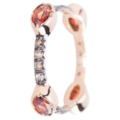 Anello uomo in oro 18 carati Topazio ovale 0,50 carati con diamanti marroni dal design moderno