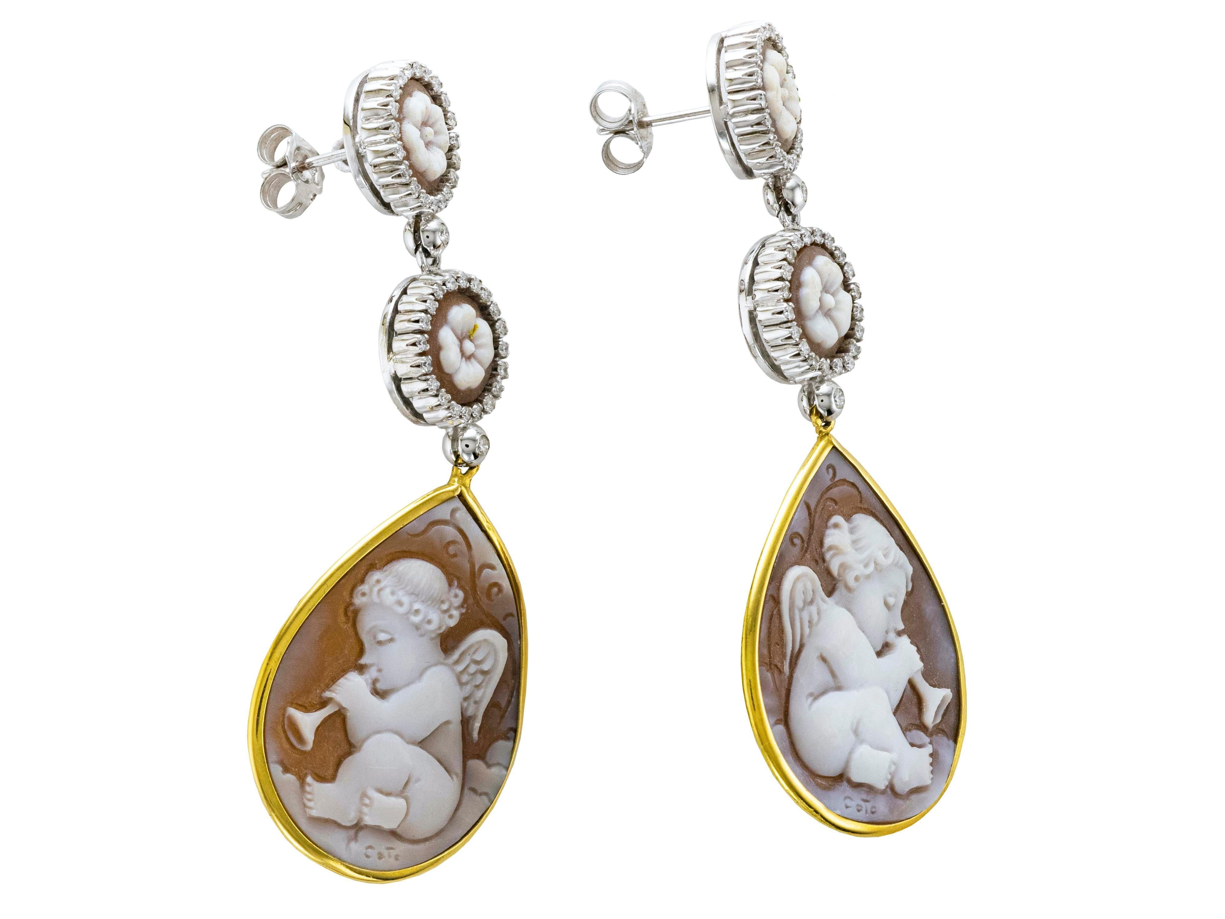18 Karat yellow and white gold articulated drop earrings.
Carved by hand cameo representing musician angels and flowers on the top side.
You can see the artist's signature on every Cameo drop.
Embellished with 40 Diamonds and two bigger Diamonds on