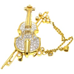 Alfiler de violonchelo de oro de 18 quilates