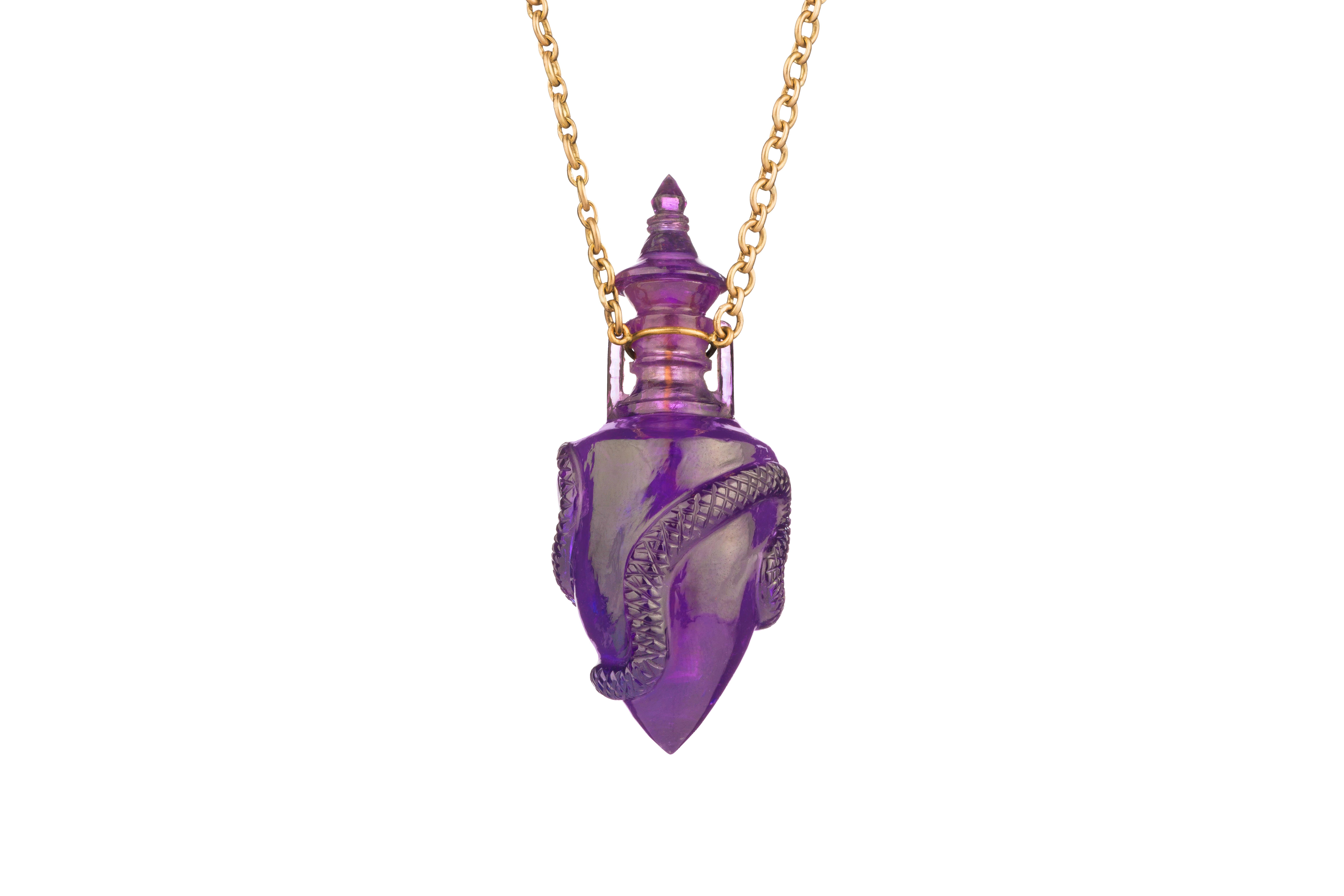 PICK YOUR POSION by OUROBOROS
Hand-carved amethyst poison bottle pendant on an 18kt gold chain. 
The bottle can be opened. 

If this item is out of stock. Everything is made to order and can take 4-6 weeks.

OUROBOROS is an artisanal brand, based