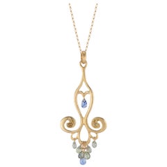 18 Karat Gold Chandelier Necklace with Blue Sapphire Teardrops and Canary Diam