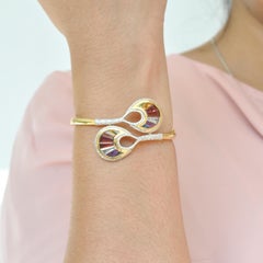 18 Karat Gold Channel Set Baguette Multi-Color Rainbow Diamond Cocktail Bracelet