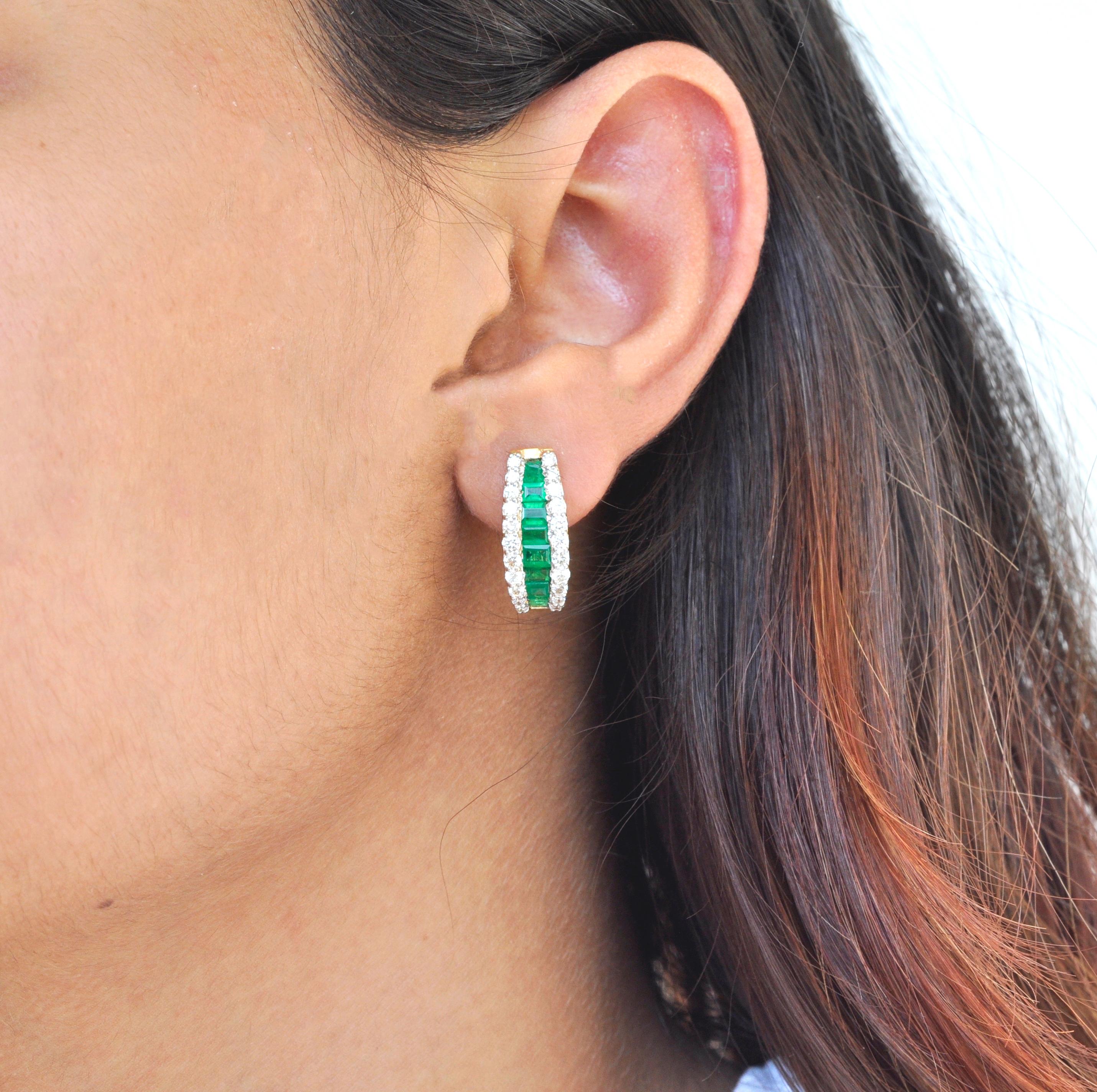 18 karat yellow gold channel set emerald baguette diamond linear huggie hoop earrings

This exclusive emerald huggie-hoop earrings is stunning. The perfectly cut baguette-cut emeralds tapering towards the ends in a channel setting are incorporated