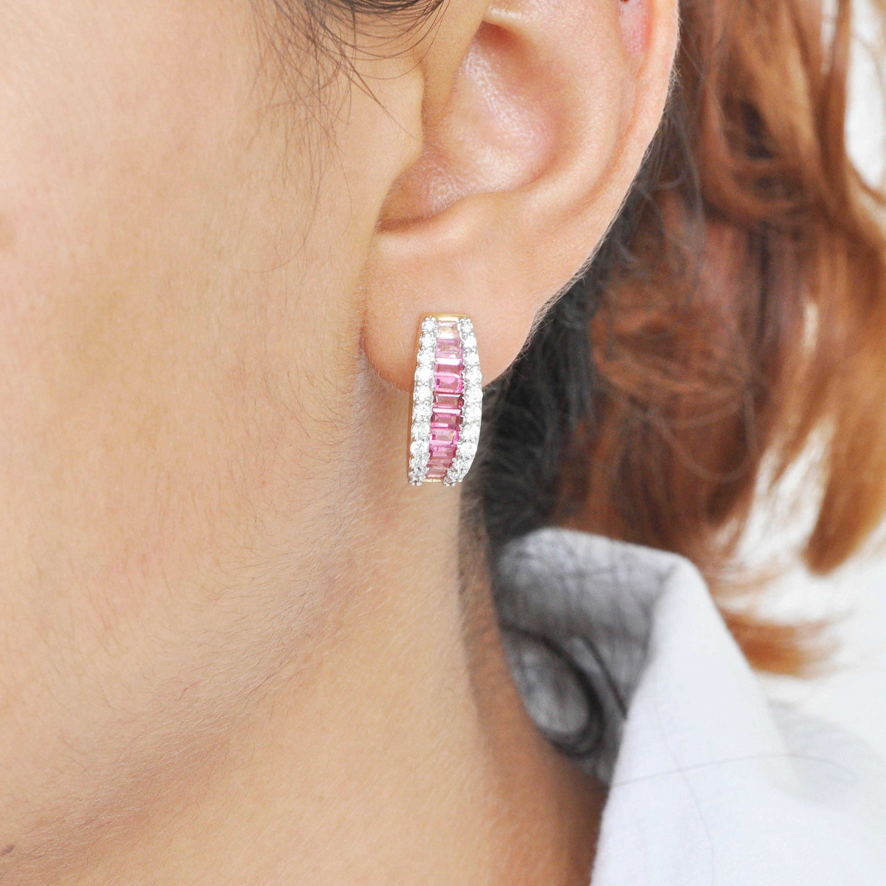 18 karat gold channel set pink tourmaline baguette diamond linear huggies hoop earrings.

The enchanting huggies hoop earrings with the shades of pink tourmalines incorporated within an equivalent layer of micro pave set diamonds on either is