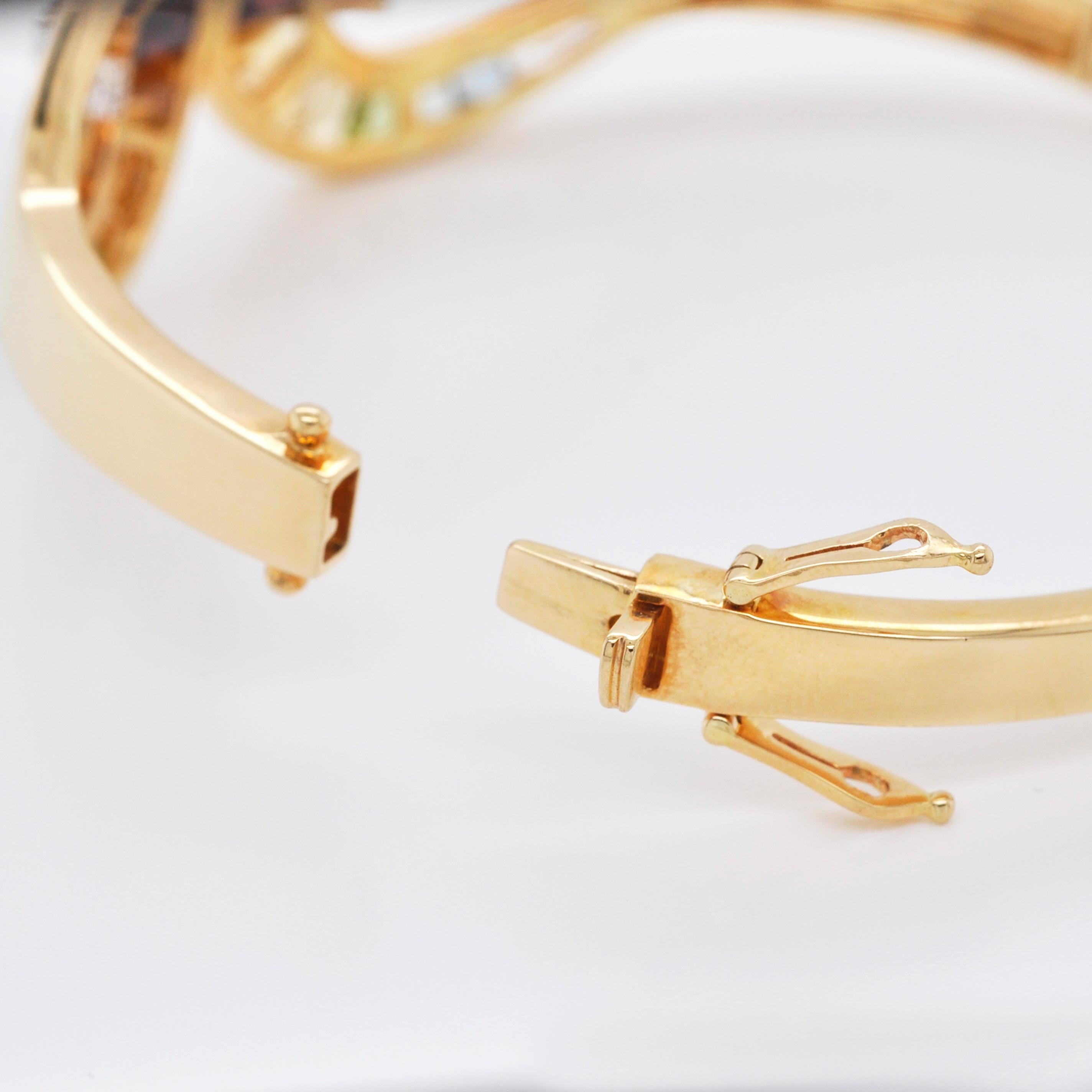 18 Karat Gold Channel Set Rainbow Multi-Color Taper Baguette Diamond Bracelet For Sale 3