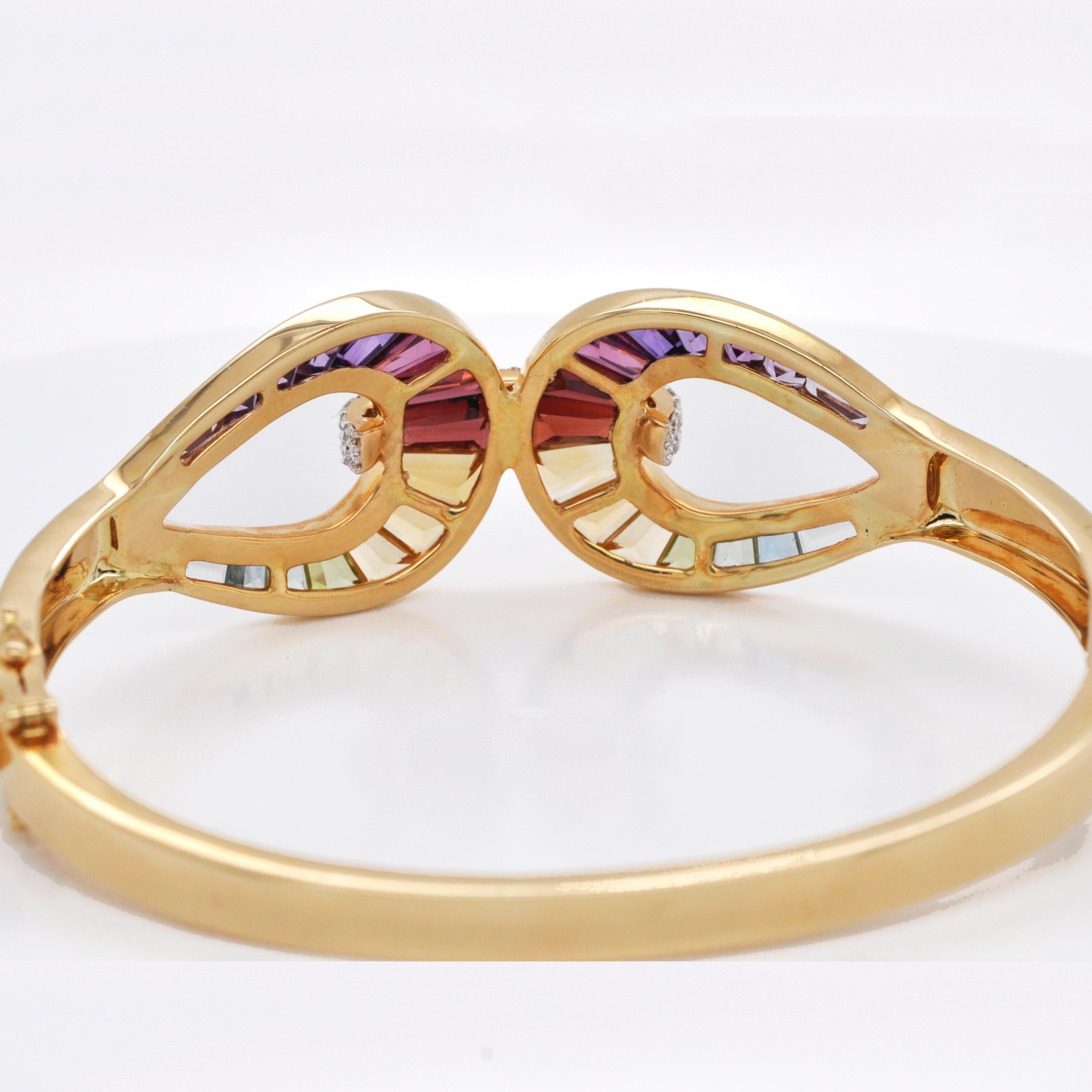 Women's 18 Karat Gold Channel Set Rainbow Multi-Color Taper Baguette Diamond Bracelet For Sale