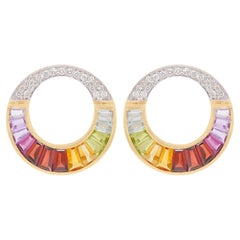 Clous d'oreilles circulaires en or 18 carats sertis de diamants baguettes arc-en-ciel
