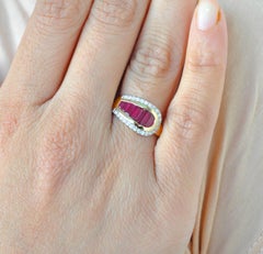 18 Karat Gold Calibre Cut Channel Set Ruby Baguettes Diamond Round Ring