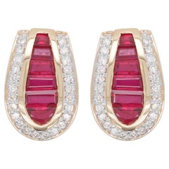 18 Karat Gold Calibre Cut Channel Set Burma Ruby Baguettes Diamond Stud Earrings