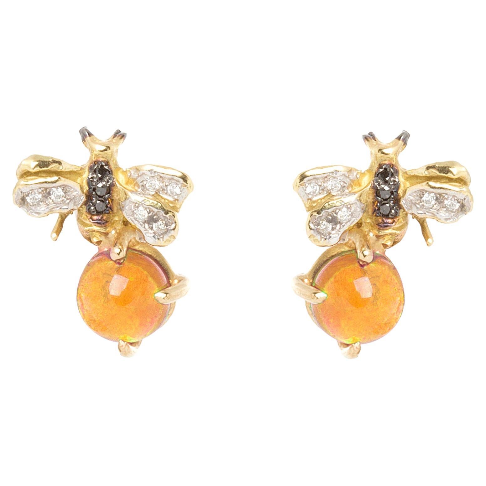 Clous d'oreilles en or 18 carats, citrine 0,16 carat, diamants blancs et noirs en forme d'abeilles