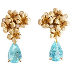 Boucles d'oreilles contemporaines en or 18 carats avec tourmalines Paraiba bleu néon