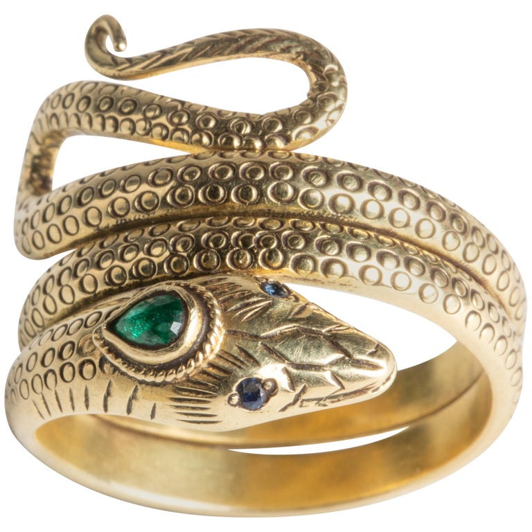 18 Karat Gold Coiled Snake Ring with Emerald and Sapphires at 1stDibs
